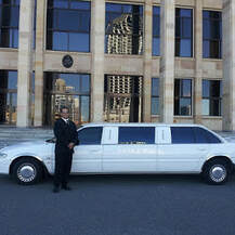 driver with one of Our limo buses